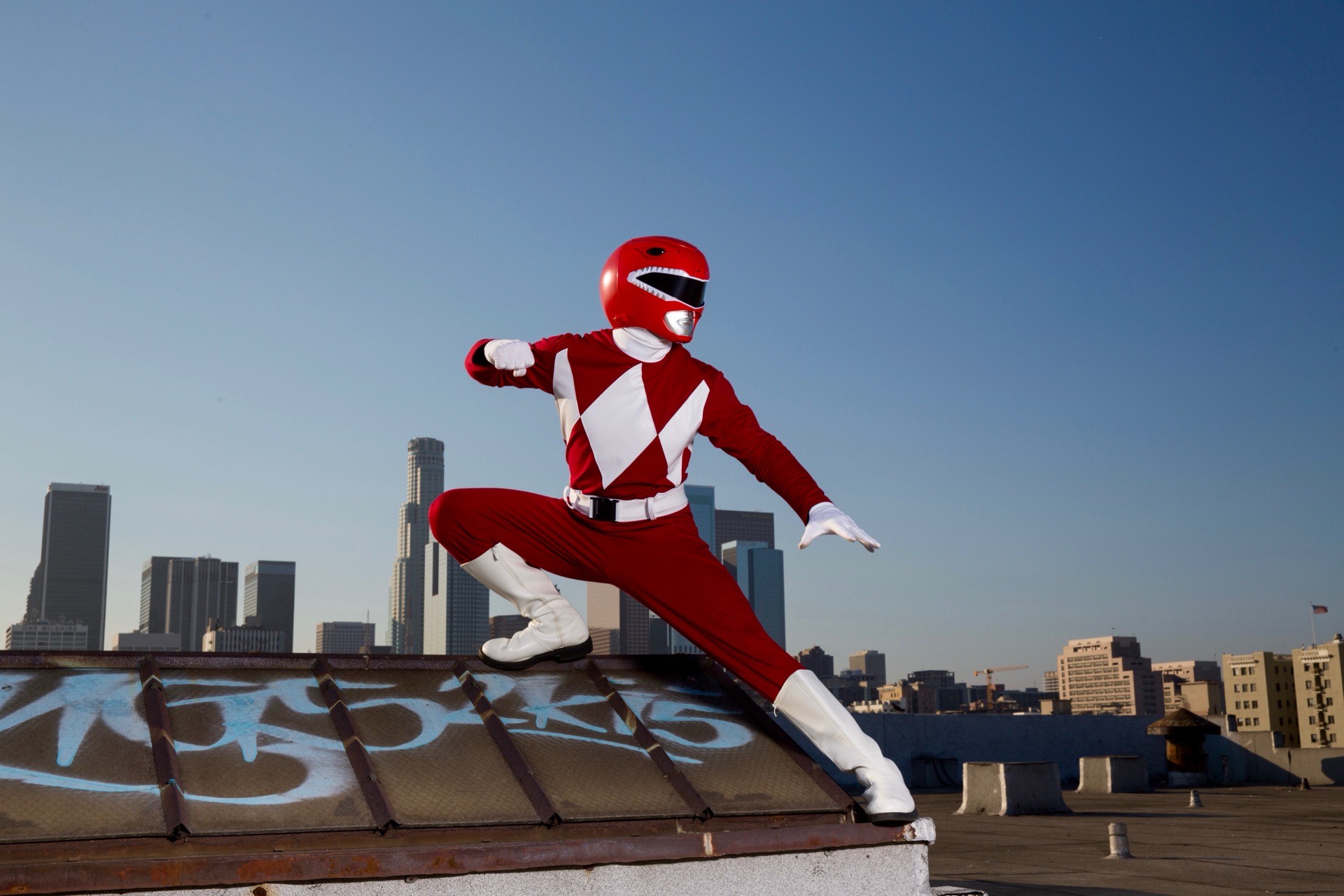 Power Ranger action hero character at a children's birthday party with kids